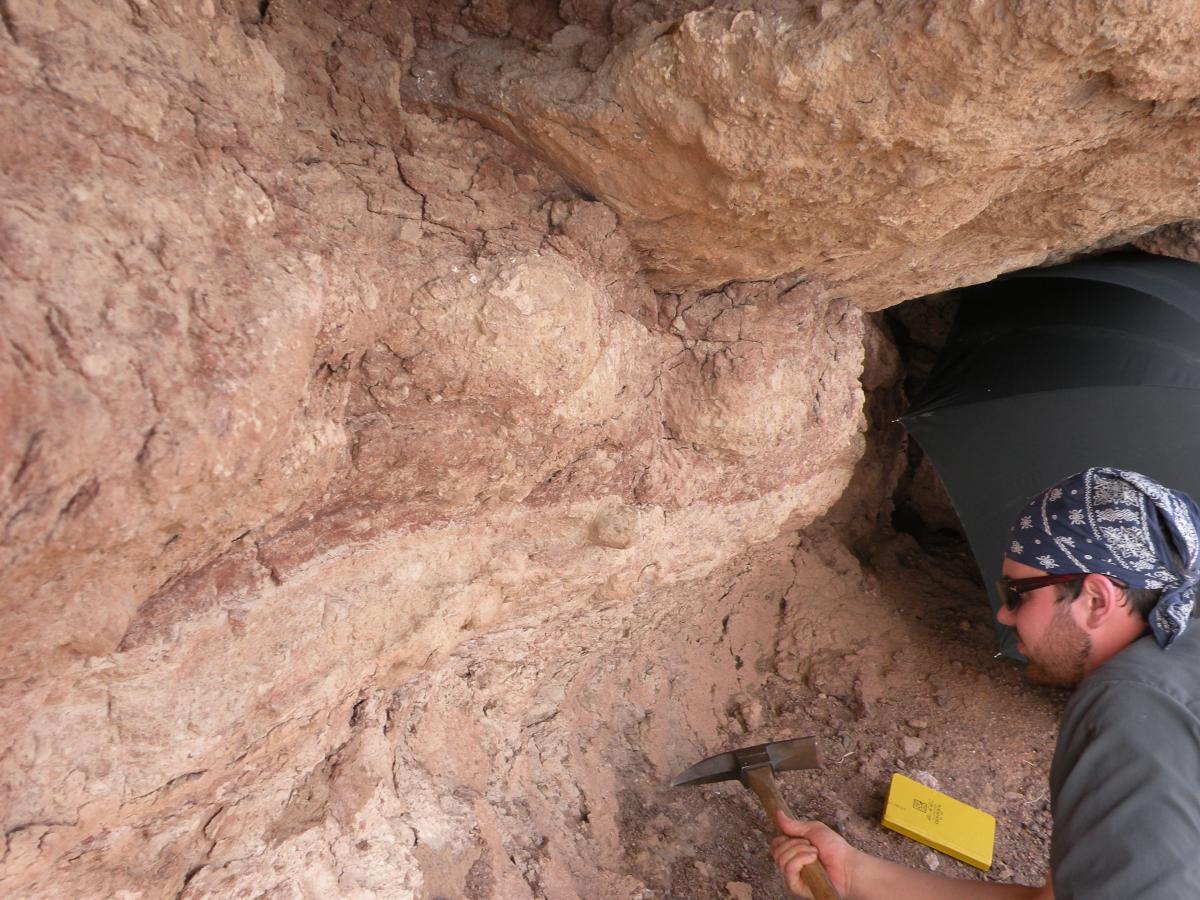 Graduate student Bryan Kaproth works at the Whipple detachment fault zone in southeastern CA.