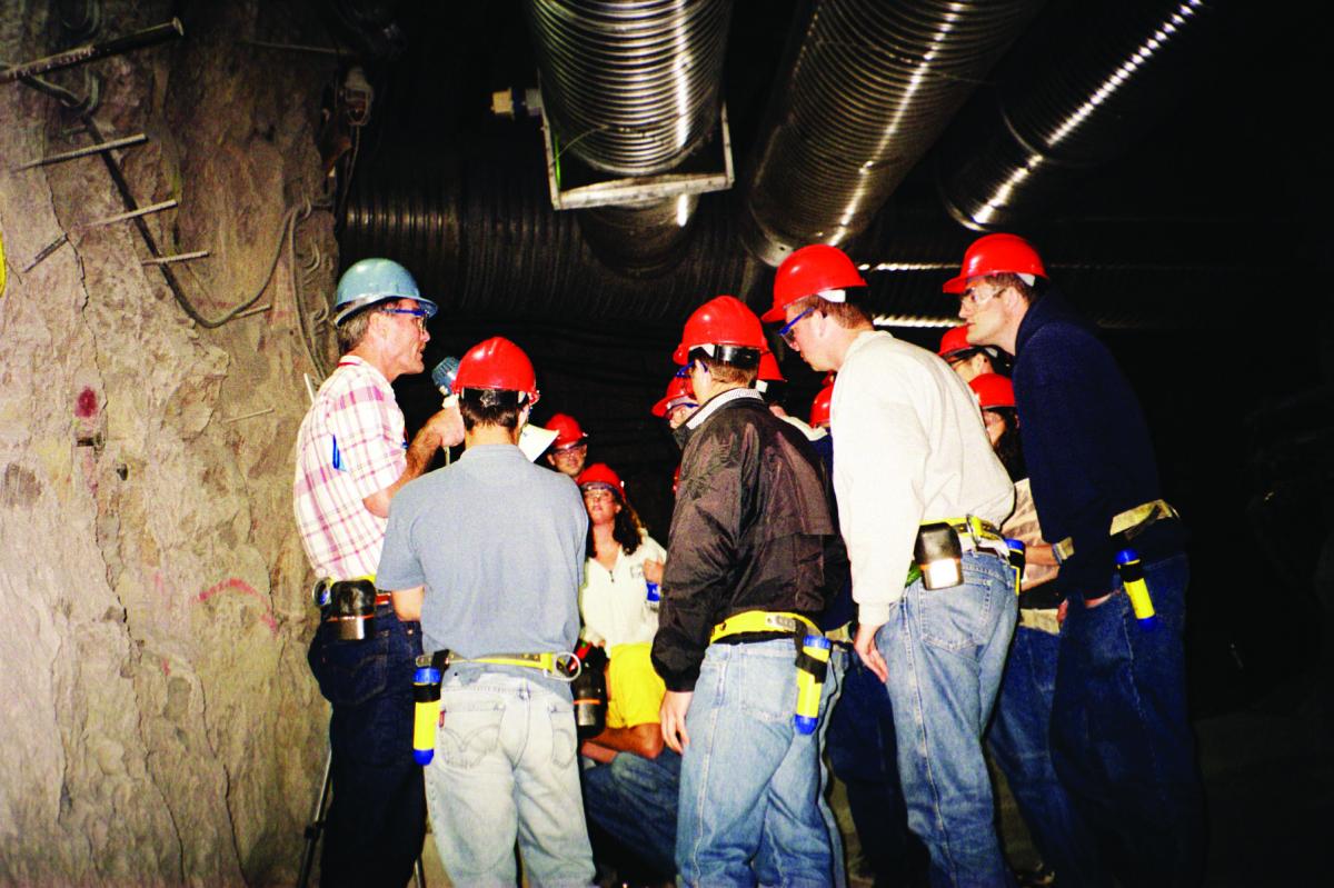 Bill Boyle, Director of DOE’s Regulatory Authority Office, Office of Civilian Radioactive Waste Management talks to students underground at one of the many in situ experiments at the Yucca Mountain Exploratory Studies Facility, NV – the ESF is a tunnel penetrating 5 miles into Yucca Mountain.